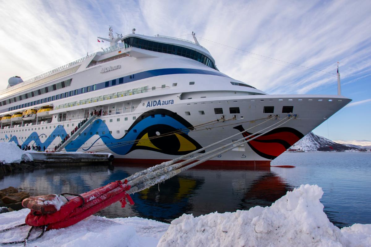 Skip at port in Arctic climate.