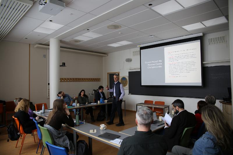 The participants of the workshop are listening to a workshop