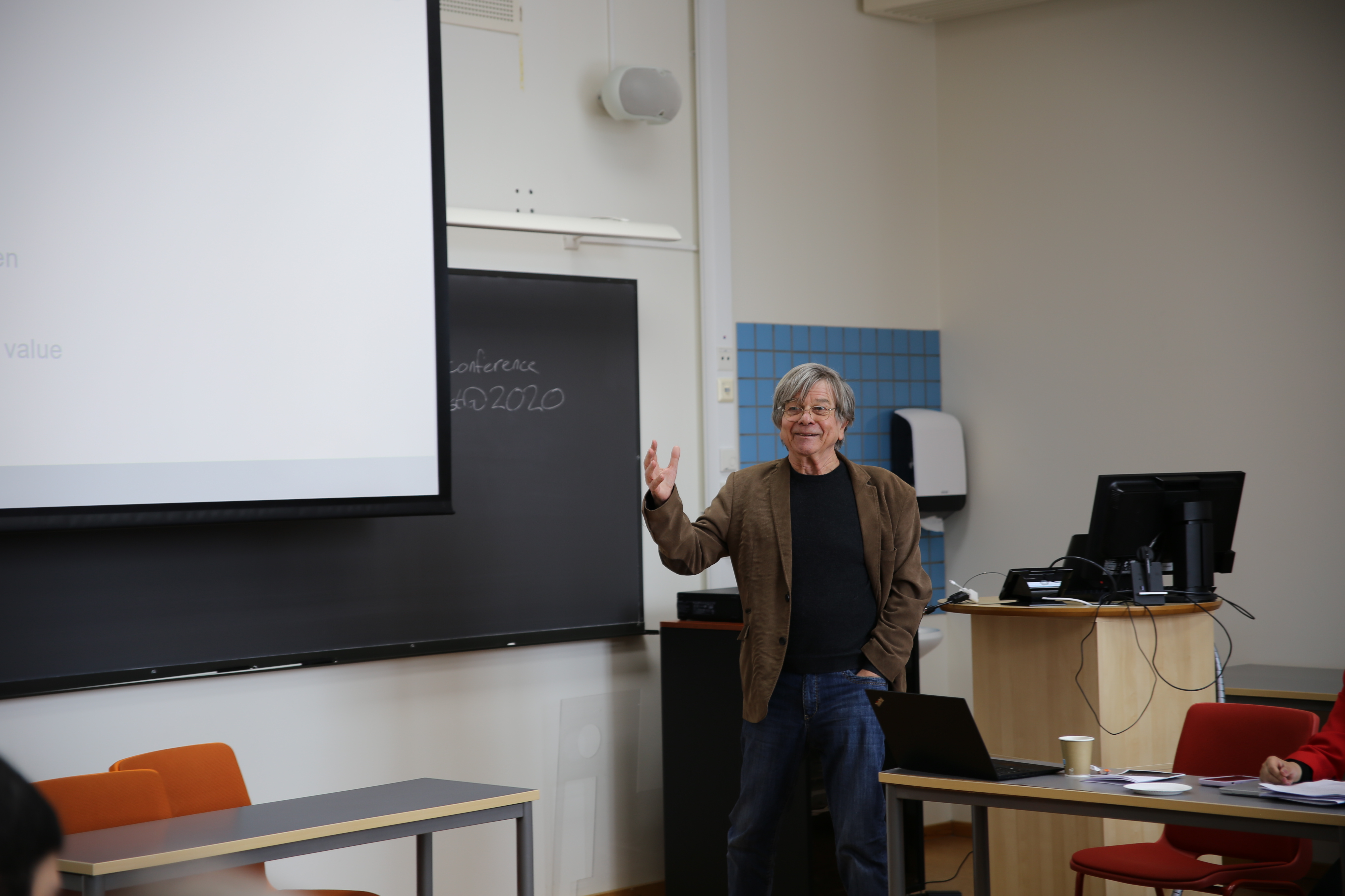 Hans-Jörg Albrecht talking to the participants during his key note lecture