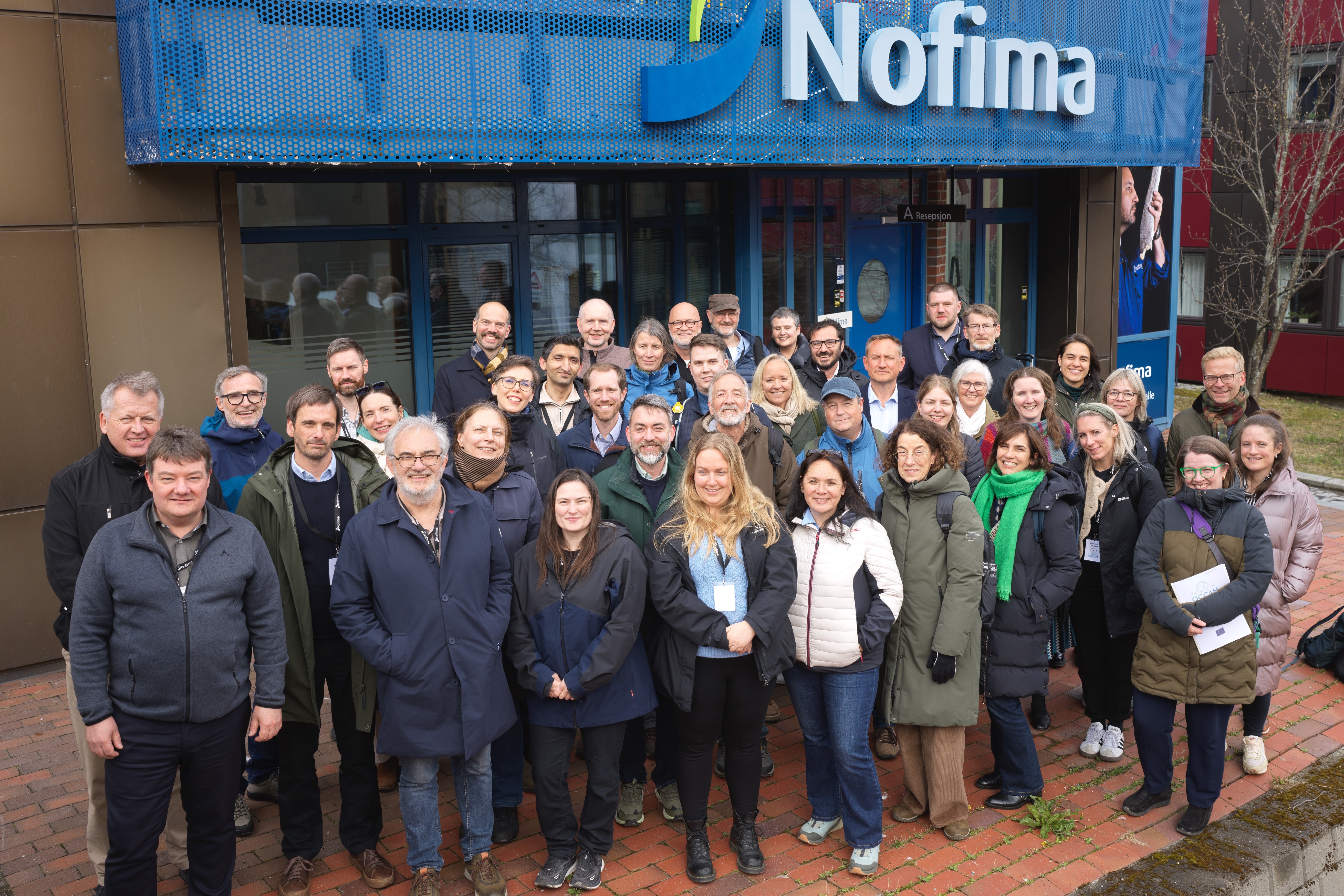 Gruppebilde Høyoppløsning Audun Iversen.jpg A group photo, several rows with people.