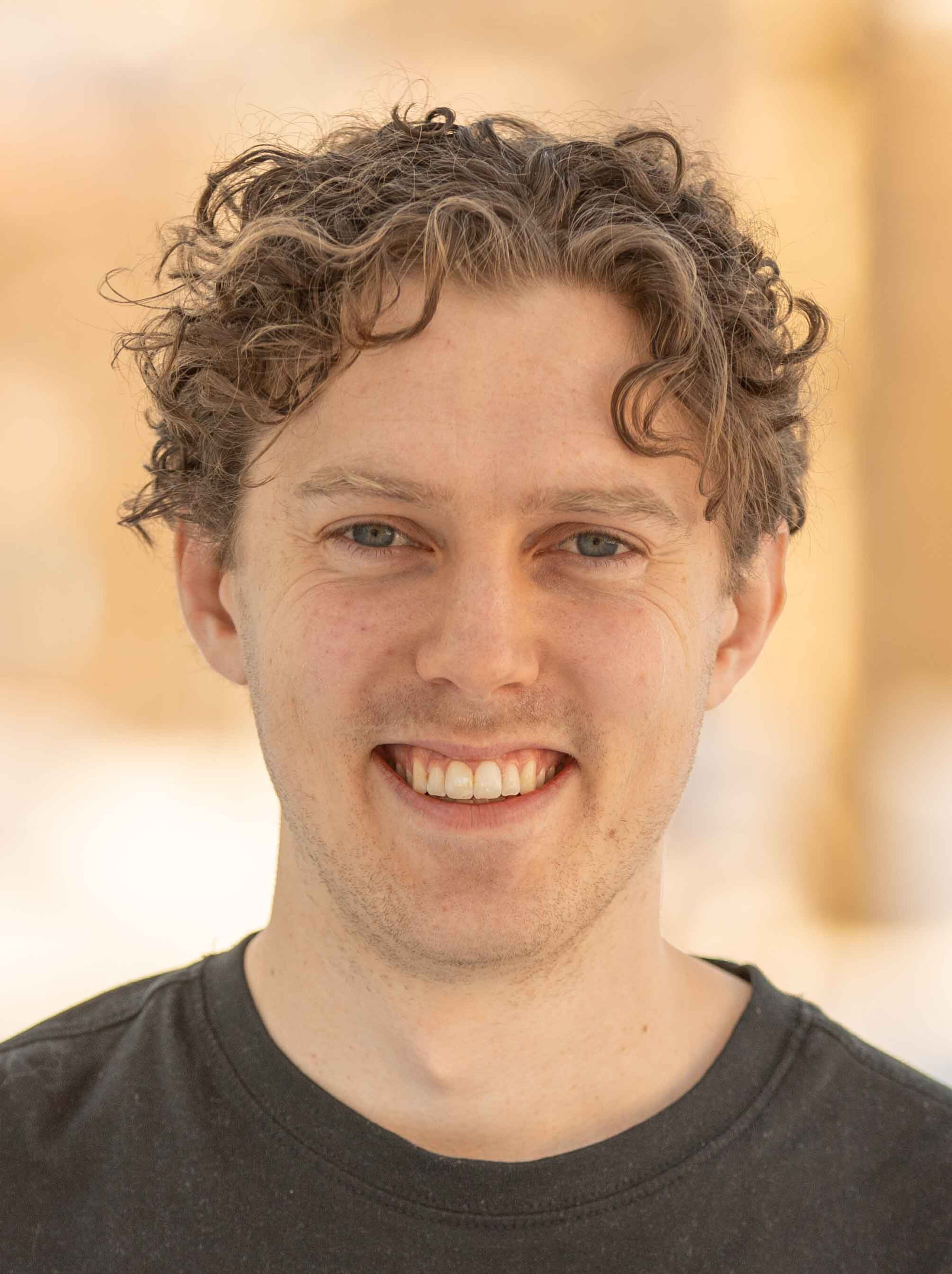 A man smiling at the camera