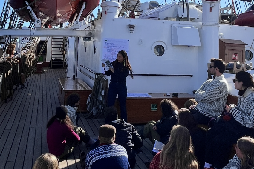 A person standing with a book