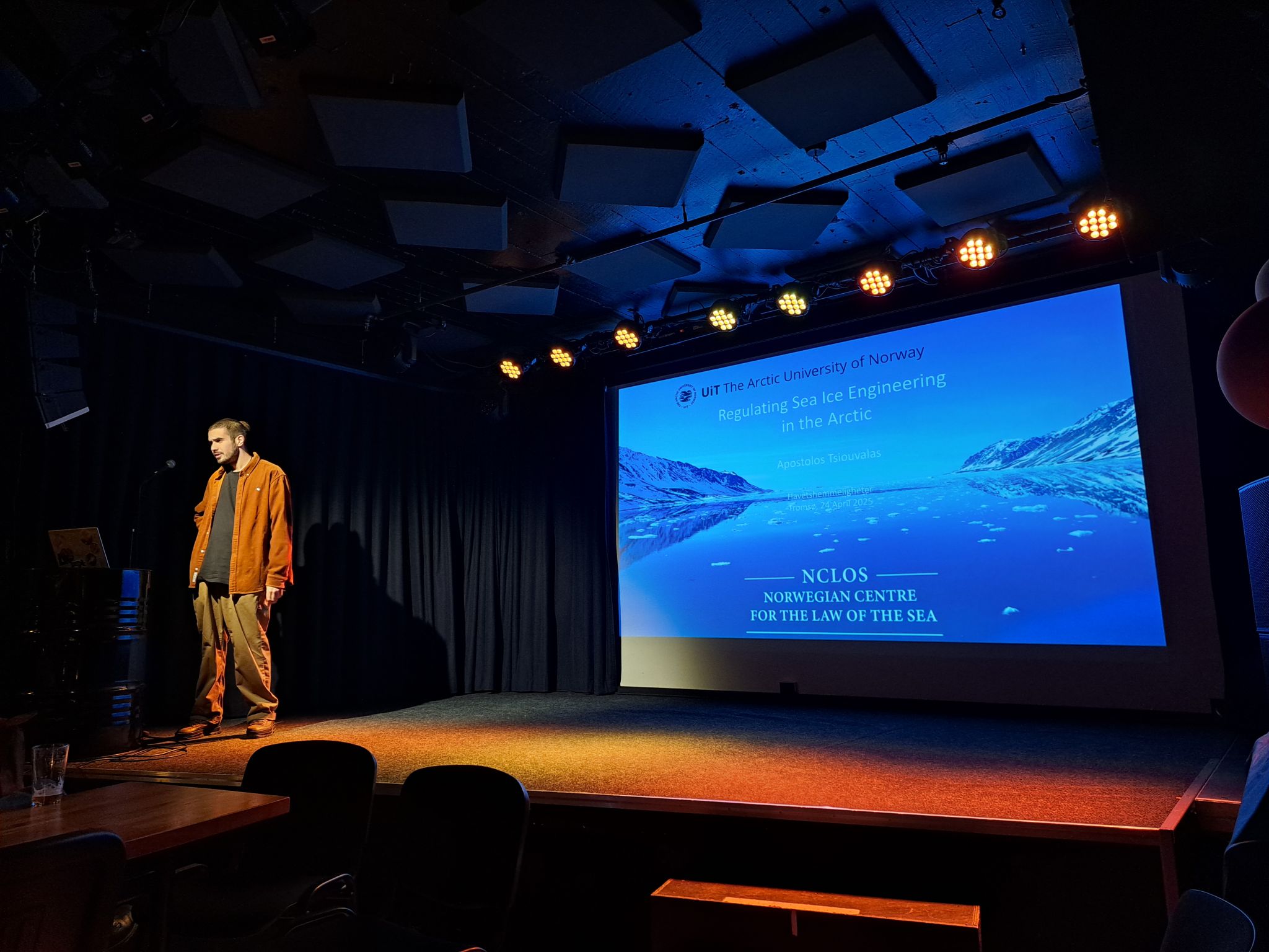 Apostolos holding his presentation at Amtmandens