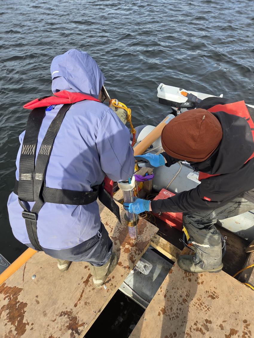 Lake sediment core retrieval.